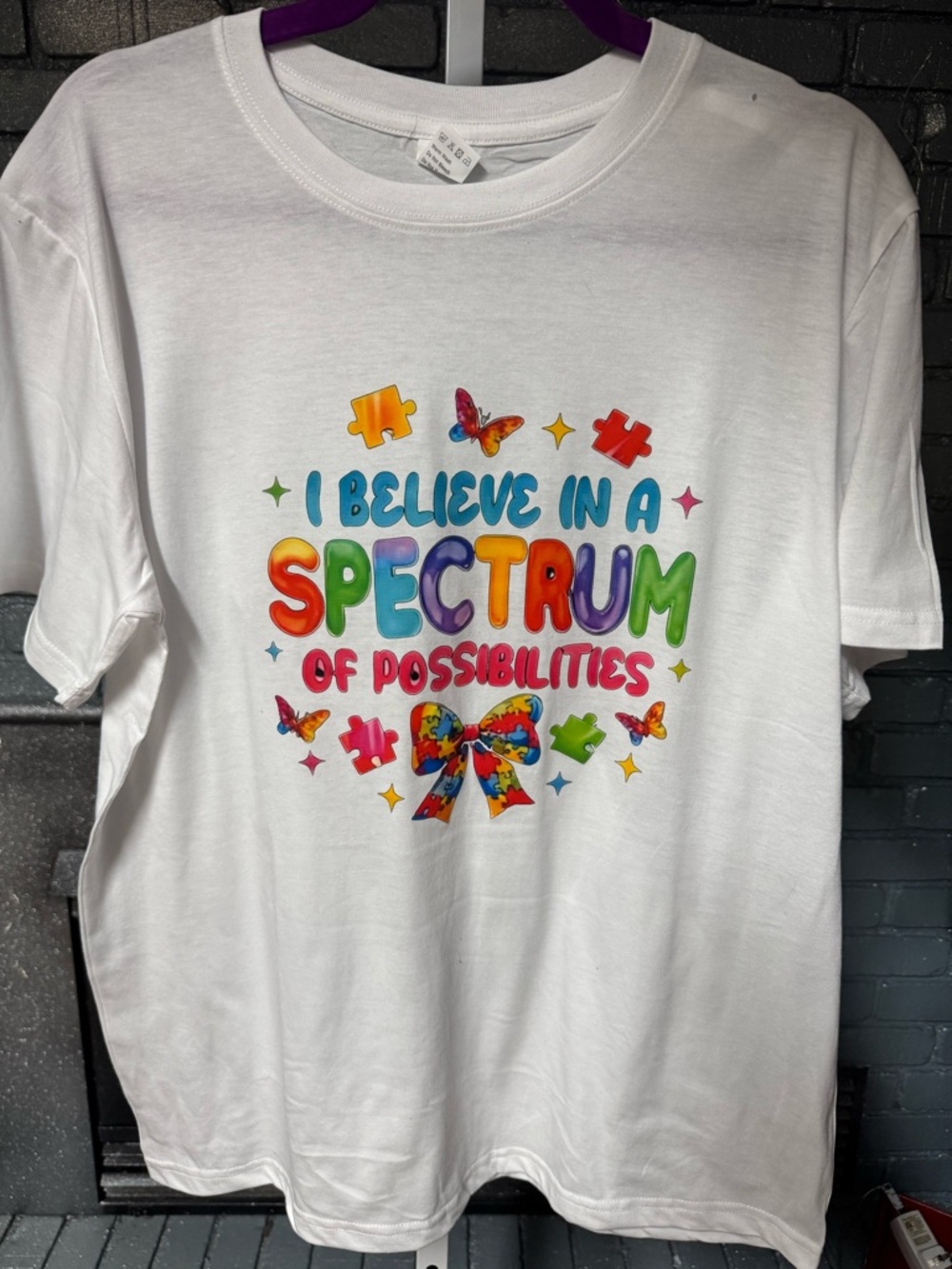 White  "I Believe in a Spectrum of Possibilities" Graphic Tee